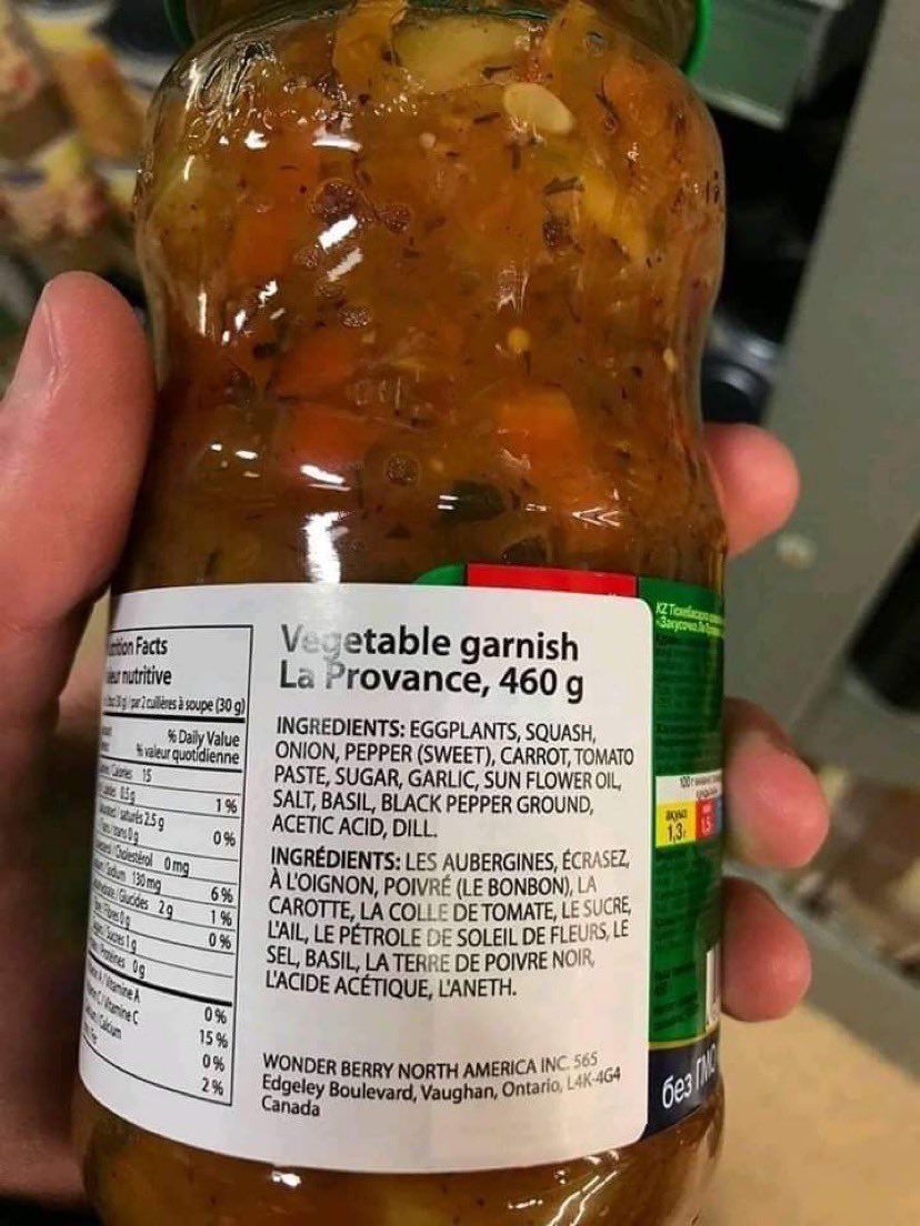 A wondrously, remarkably bad machine translation into French of a list of ingredients on a commercial bottle of sauce.