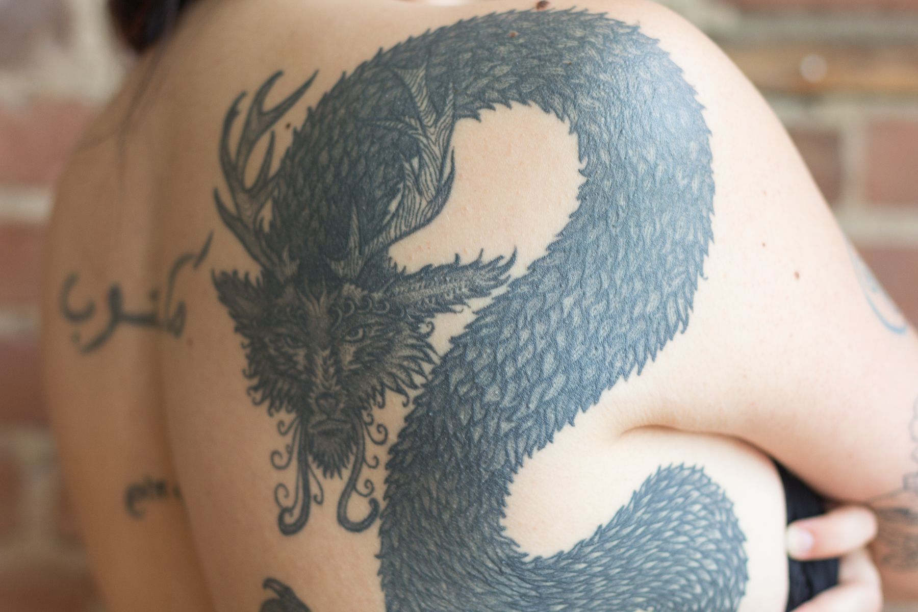 Tribal Dragon Tattoo Vector Art - Stock Image by Vyusur